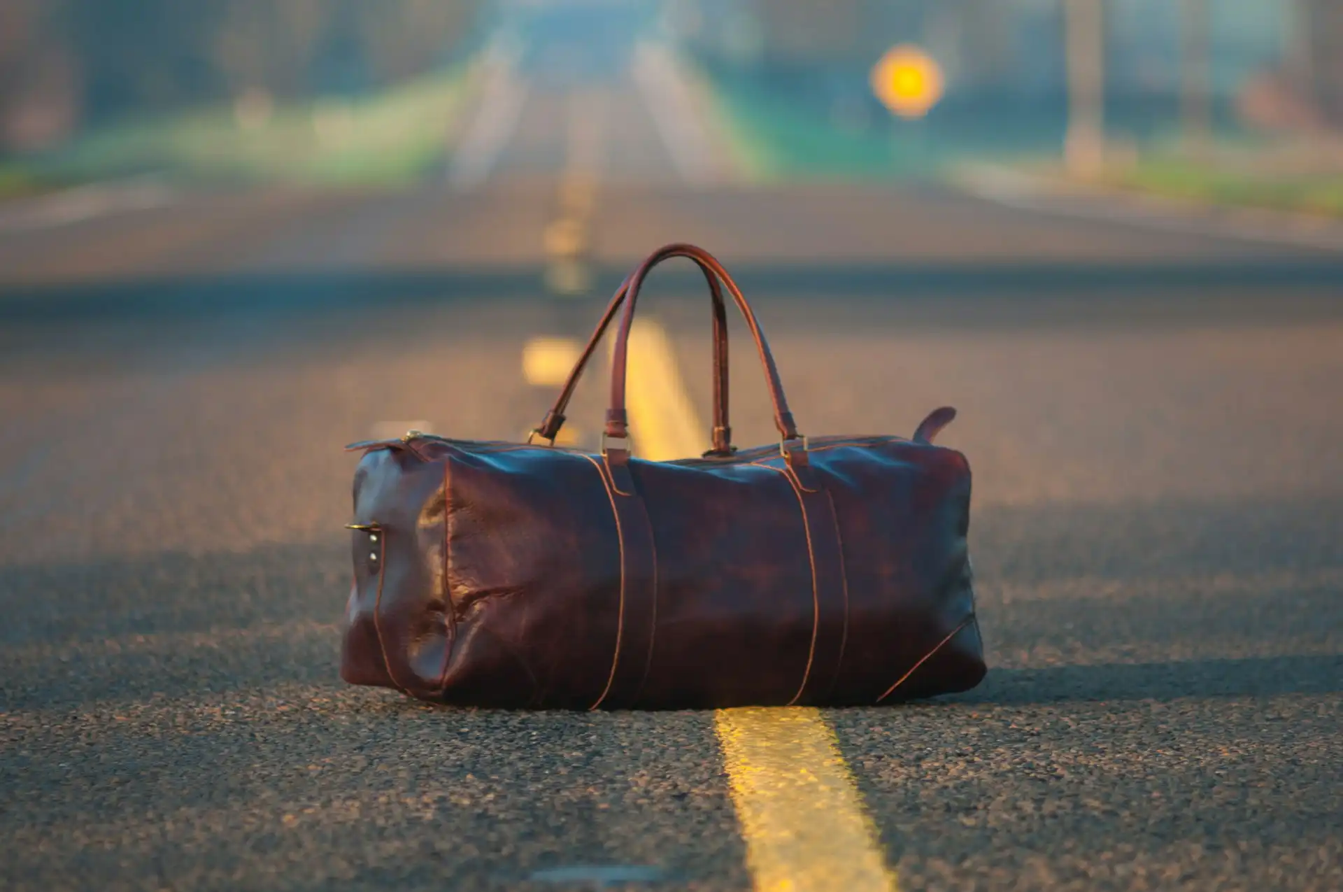 Soft duffel bag packed for a driving tour — the right luggage makes all the difference