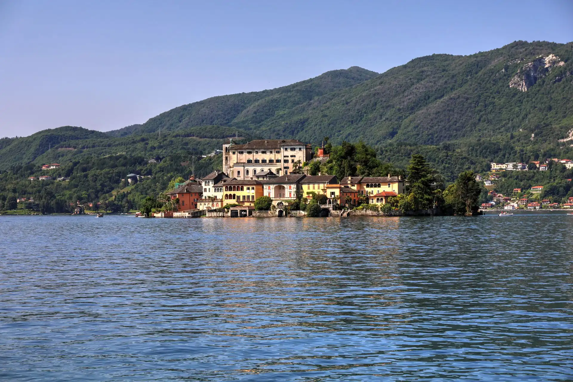 Orta San Giulio village on the shore of Lake Orta, with Isola San Giulio beyond